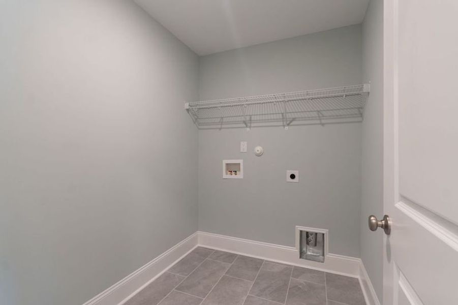 Spacious, unfurnished interior of a new home in Osprey Landing, Southport (Image 21).