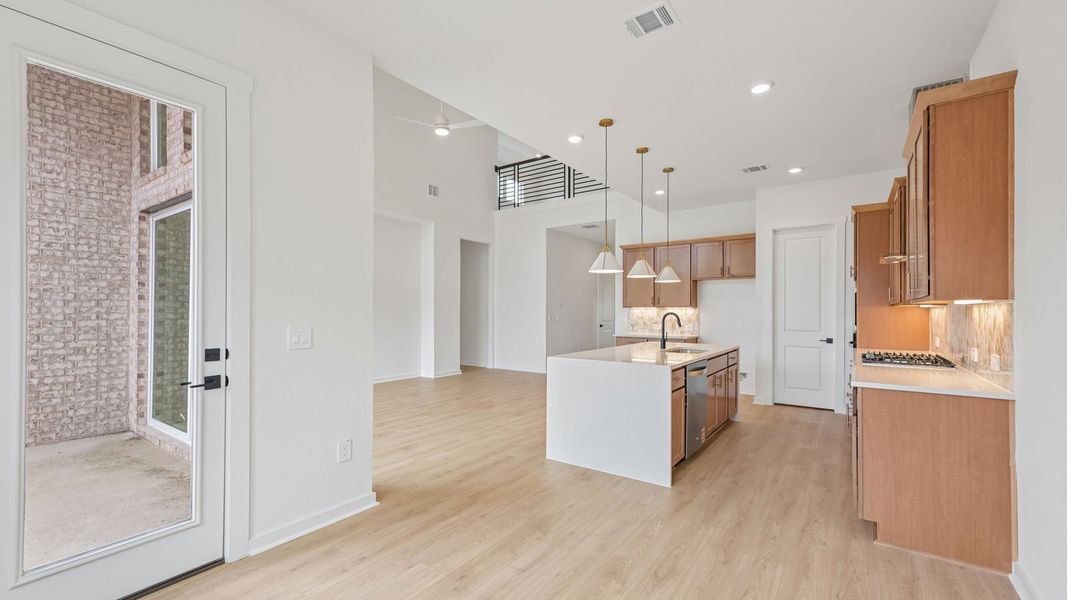 Furnished interior view inside a new home in The Enclave at Bar W Ranch, Leander (Image 7).