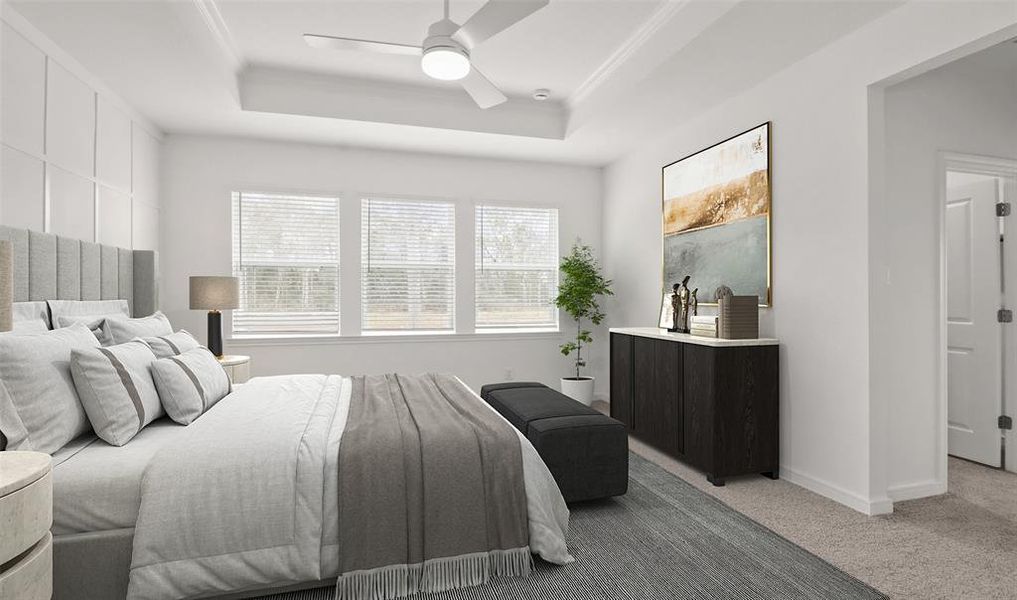 Spacious primary suite with feature wall