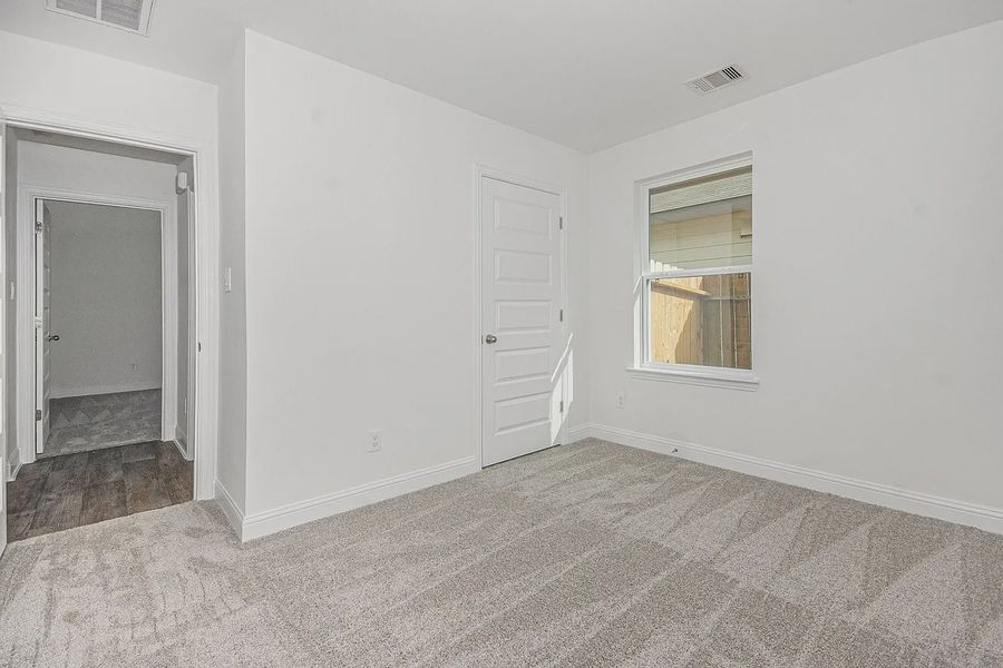 Spacious, unfurnished interior of a new home in Kiber Reserve, Angleton (Image 18). Spacious, unfurnished interior of a new home in Kiber Reserve, Angleton (Image 18).