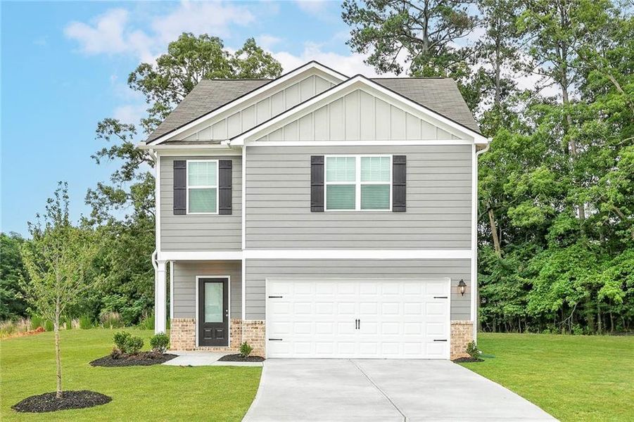 Front exterior of a new home in Avondale North, Conyers, GA, highlighting curb appeal (Image 1). Front exterior of a new home in Avondale North, Conyers, GA, highlighting curb appeal (Image 1).