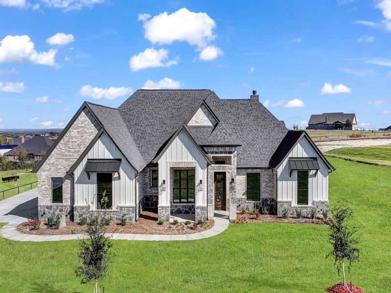 Front exterior of a new home in , Weatherford, TX, highlighting curb appeal (Image 24).