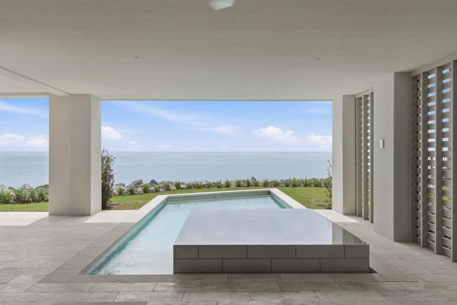Exterior details and patio area of a home in , Sullivan's Island (Image 41).