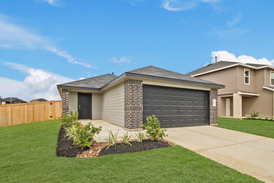 Front exterior of a new home in Mill Creek, Magnolia, TX, highlighting curb appeal (Image 2). Front exterior of a new home in Mill Creek, Magnolia, TX, highlighting curb appeal (Image 2).