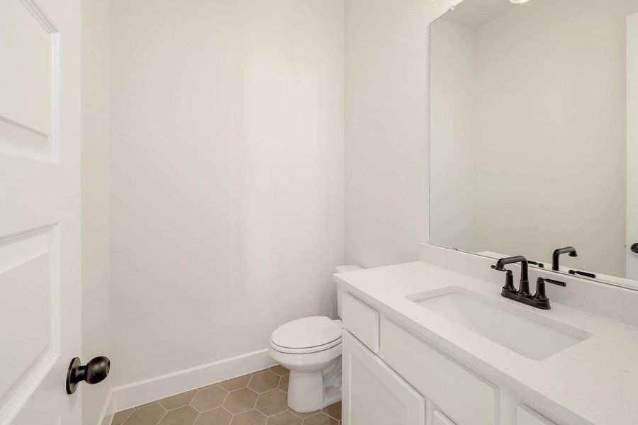 Furnished interior view inside a new home in Parmer Ranch - 60', Georgetown (Image 13).