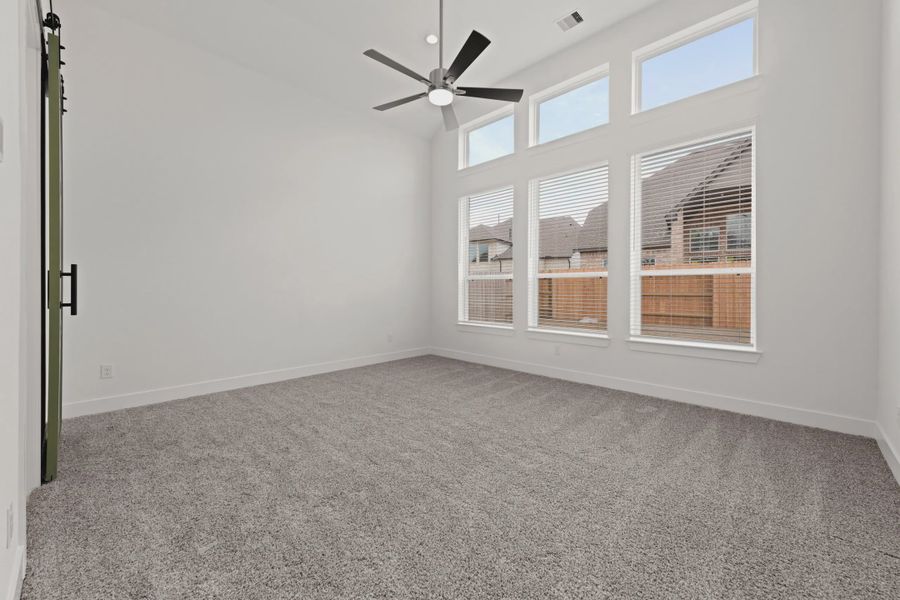 Representative unfurnished interior of a home built from the Rollins by Chesmar Homes in Gregg Ranch, Marble Falls (Image 9).