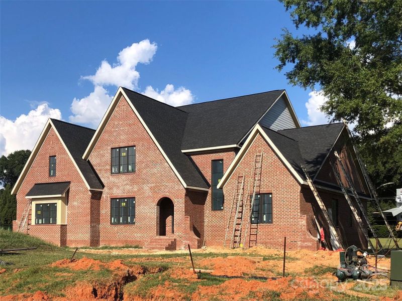 Front exterior of a new home in , Mint Hill, NC, highlighting curb appeal (Image 1). Front exterior of a new home in , Mint Hill, NC, highlighting curb appeal (Image 1).