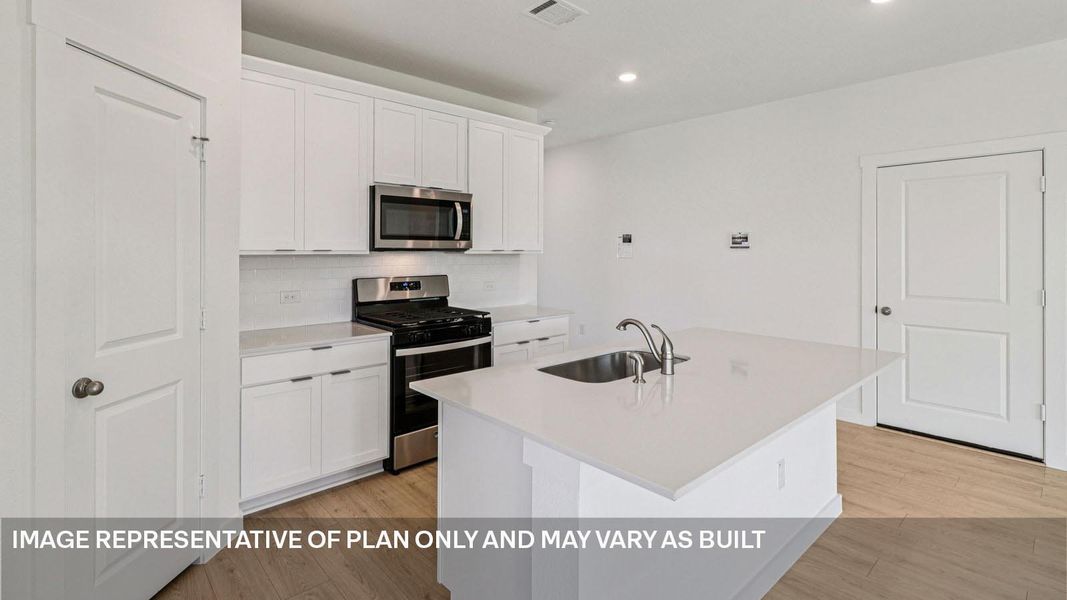 Furnished interior view inside a new home in Monarch Ranch, Manor (Image 6).