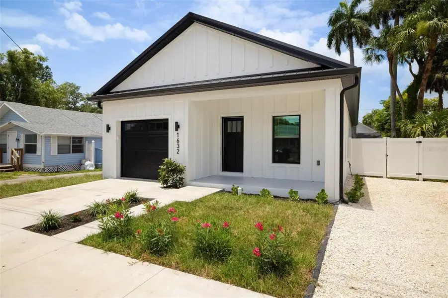 Front exterior of a new home in , Bradenton, FL, highlighting curb appeal (Image 1). Front exterior of a new home in , Bradenton, FL, highlighting curb appeal (Image 1).