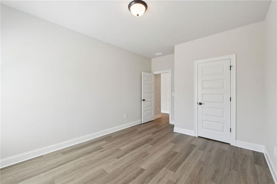Spacious, unfurnished interior of a new home in Vines at Mill Creek - Estate Series, Braselton (Image 53).