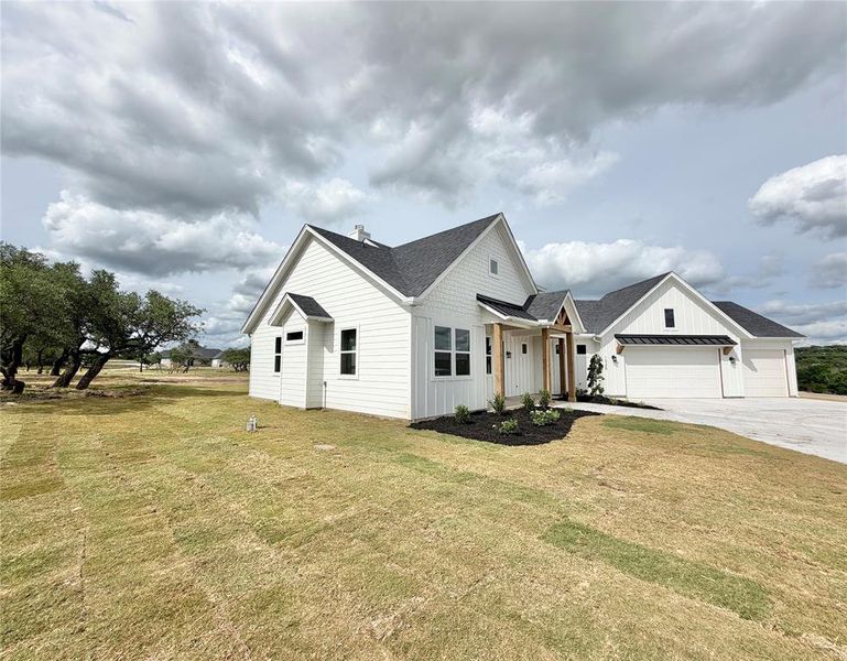 Front exterior of a new home in , Weatherford, TX, highlighting curb appeal (Image 28).