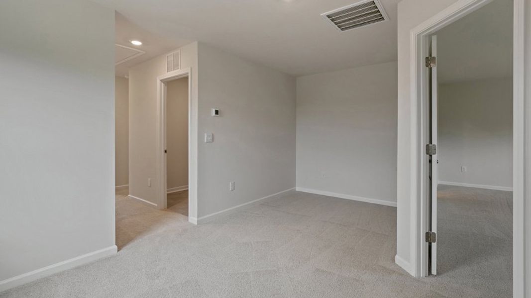 Spacious, unfurnished interior of a new home in The Grove at Matthews Landing, Fuquay Varina (Image 20).