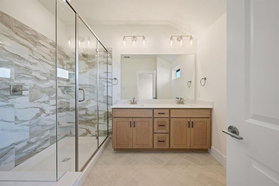 An owner's bath with plenty of style and space for two. An owner's bath with plenty of style and space for two.