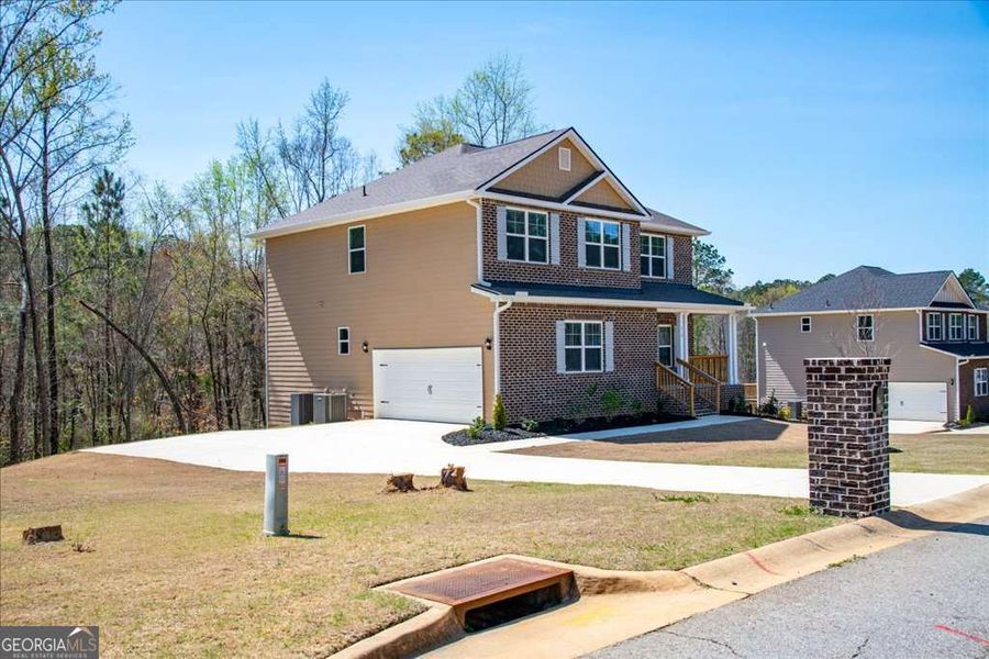 Front exterior of a new home in Carson's Walk, Macon, GA, highlighting curb appeal (Image 19).