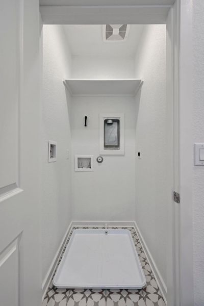 **Photos are of a different unit. Color schemes and finishes may differ**