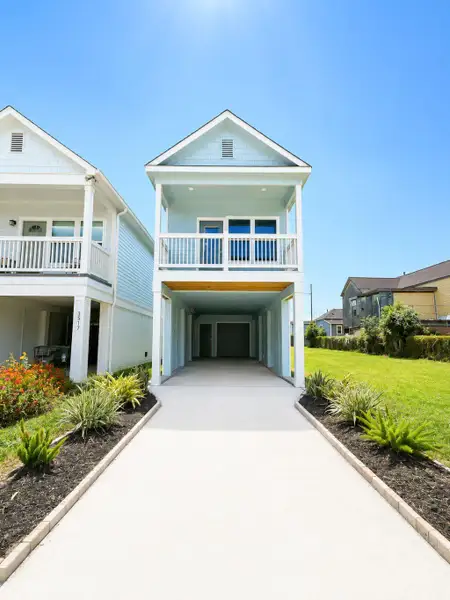 Front exterior of a new home in , Galveston, TX, highlighting curb appeal (Image 1). Front exterior of a new home in , Galveston, TX, highlighting curb appeal (Image 1).