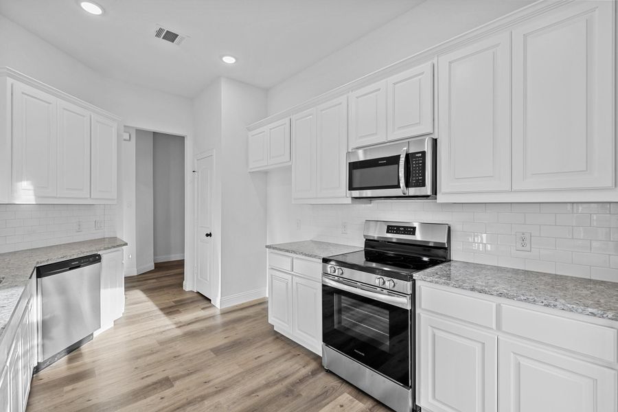 Representative furnished interior of a home built from the Sherwood by Cheldan Homes in Sunset Ridge, Keene (Image 16). Representative furnished interior of a home built from the Sherwood by Cheldan Homes in Sunset Ridge, Keene (Image 16).
