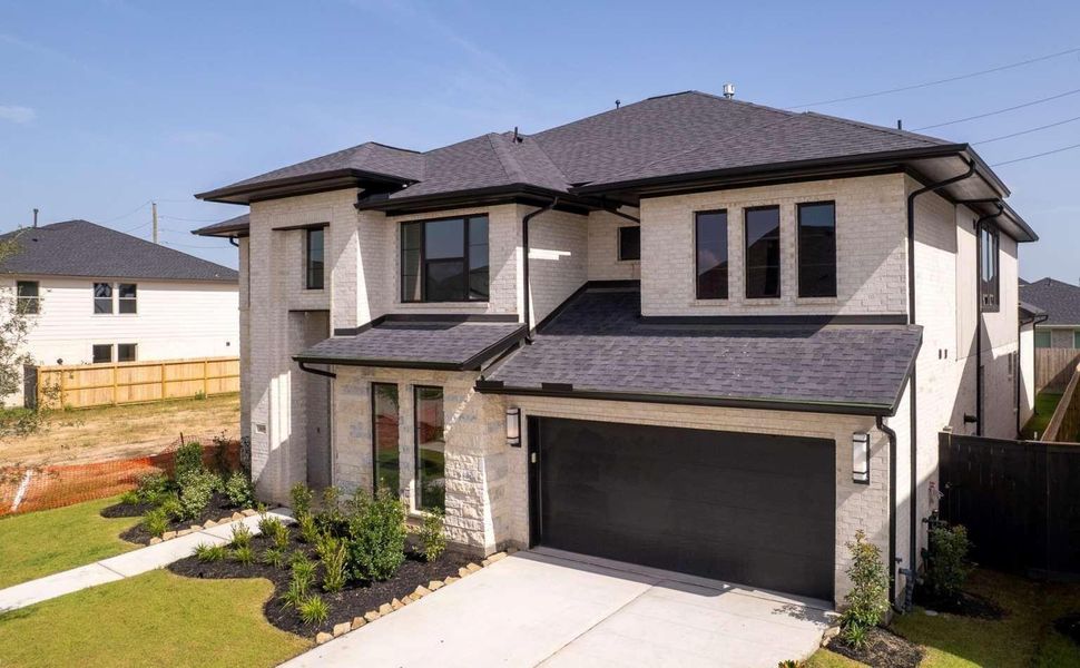 Front exterior of a new home in , Richmond, TX, highlighting curb appeal (Image 24).