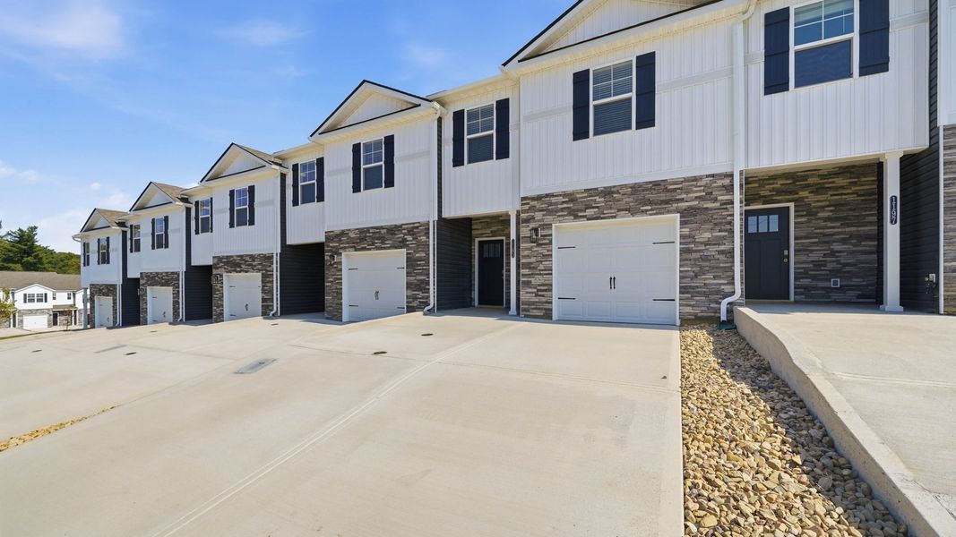 Front exterior of a new home in The Arbor Townhomes, Kingsport, TN, highlighting curb appeal (Image 2).
