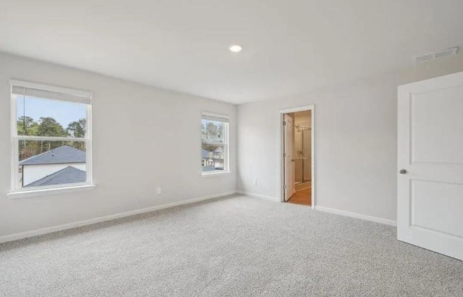 Spacious, unfurnished interior of a new home in Hawthorne Station, College Park (Image 7).