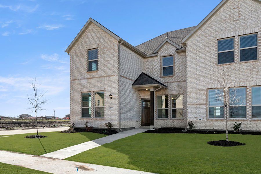Representative exterior photo of a completed home built from the Conroe by Impression Homes in Creekshaw, Royse City, TX (Image 2). Representative exterior photo of a completed home built from the Conroe by Impression Homes in Creekshaw, Royse City, TX (Image 2).