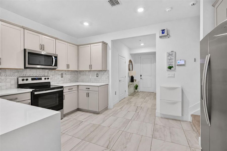 Furnished interior view inside a new home in , Pembroke Pines (Image 27).