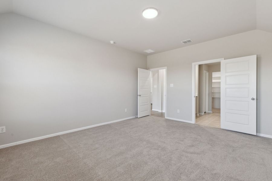 Primary Suite in the Harrison home plan by Trophy Signature Homes – REPRESENTATIVE PHOTO Primary Suite in the Harrison home plan by Trophy Signature Homes – REPRESENTATIVE PHOTO