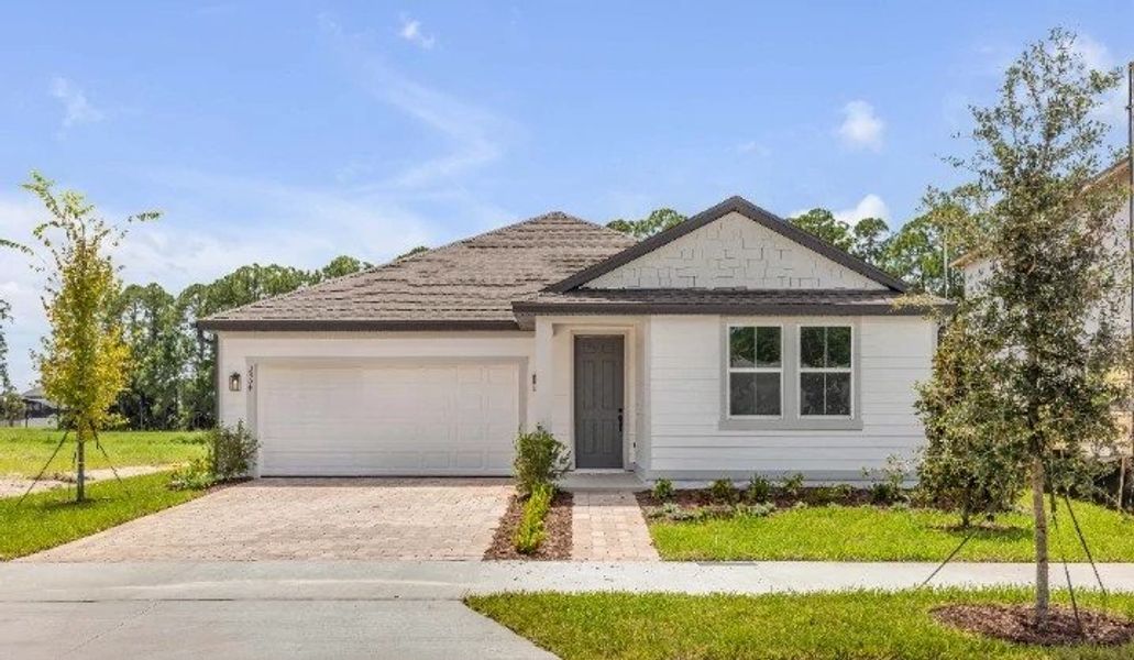 Front exterior of a new home in Ardisia Park, New Smyrna Beach, FL, highlighting curb appeal (Image 1). Front exterior of a new home in Ardisia Park, New Smyrna Beach, FL, highlighting curb appeal (Image 1).