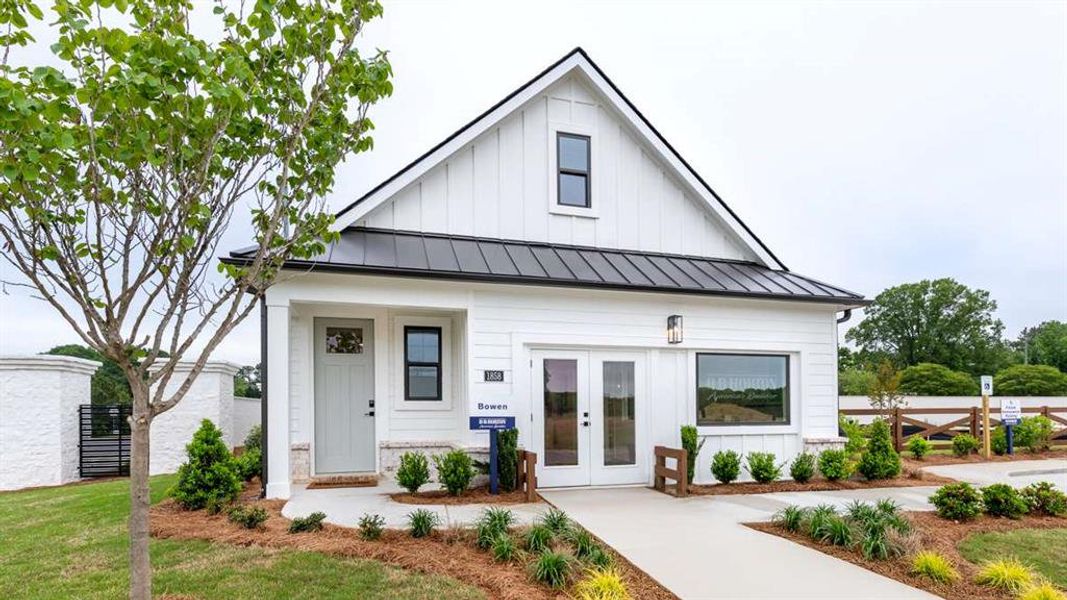 Front exterior of a new home in The Village at Sandy Plains, Marietta, GA, highlighting curb appeal (Image 21).