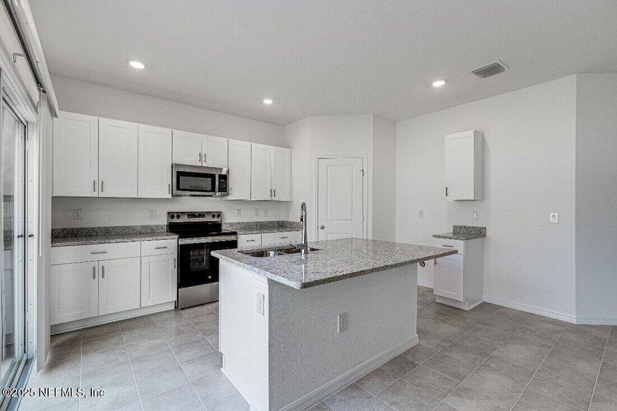 Furnished interior view inside a new home in Coopers Meadow, Jacksonville (Image 11).