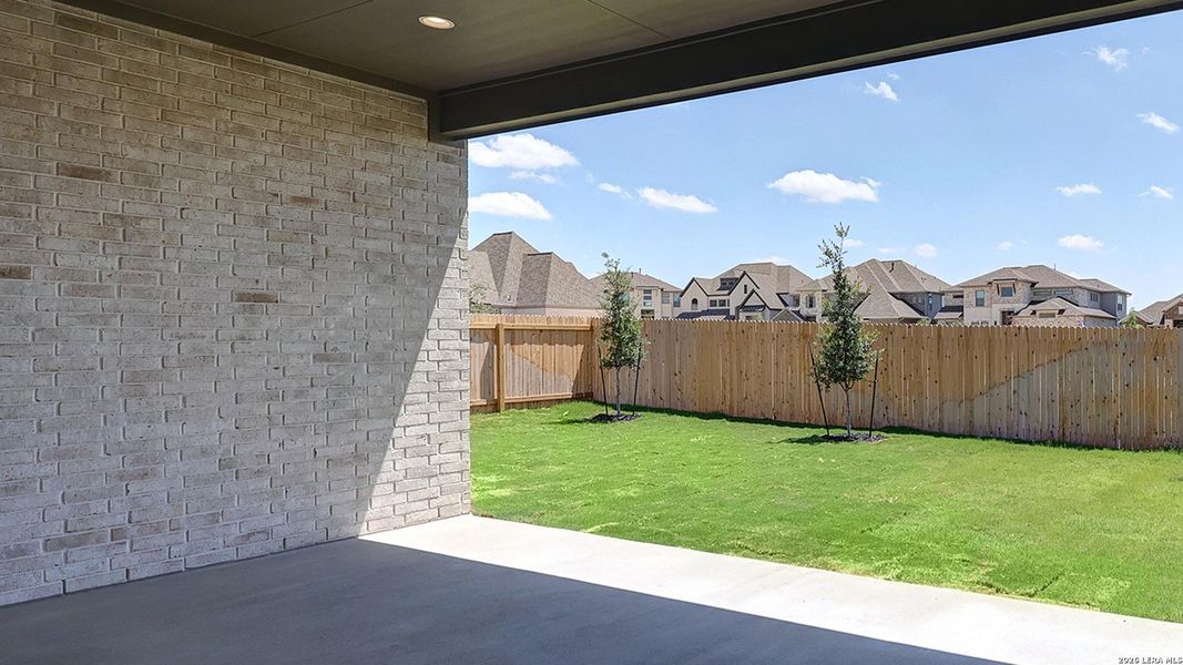 Exterior details and patio area of a home in Kallison Ranch, San Antonio (Image 24).