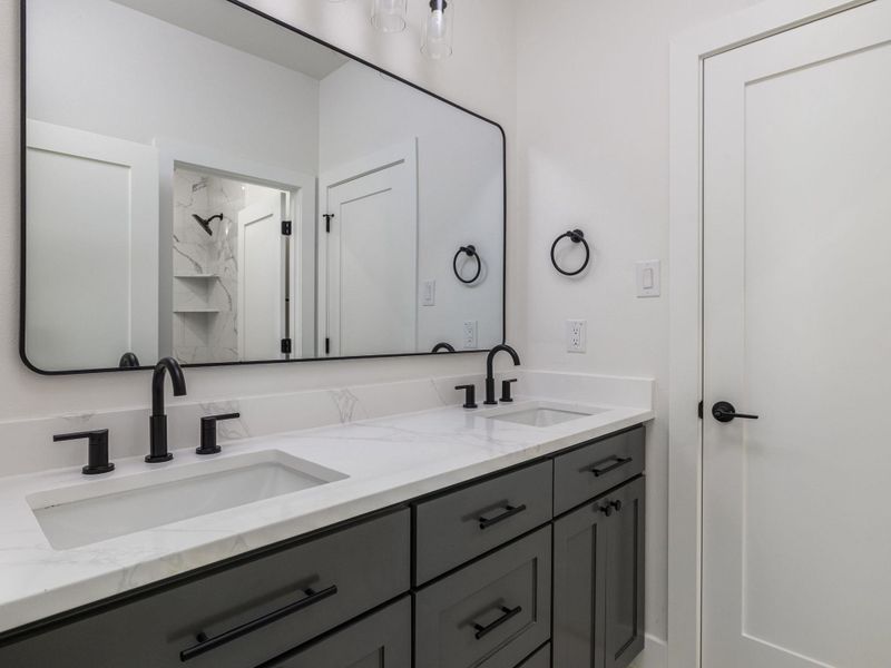 Jack and Jill bathroom with double sinks Jack and Jill bathroom with double sinks