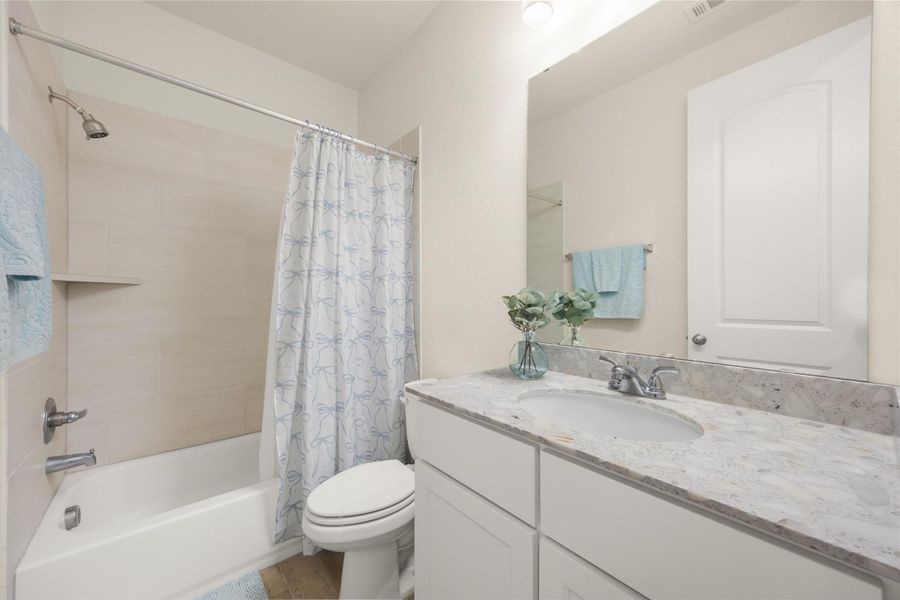 Furnished interior view inside a new home in Amira, Tomball (Image 13).