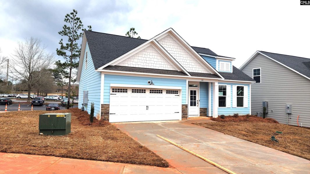 Front exterior of a new home in Bickley Station, Irmo, SC, highlighting curb appeal (Image 1). Front exterior of a new home in Bickley Station, Irmo, SC, highlighting curb appeal (Image 1).