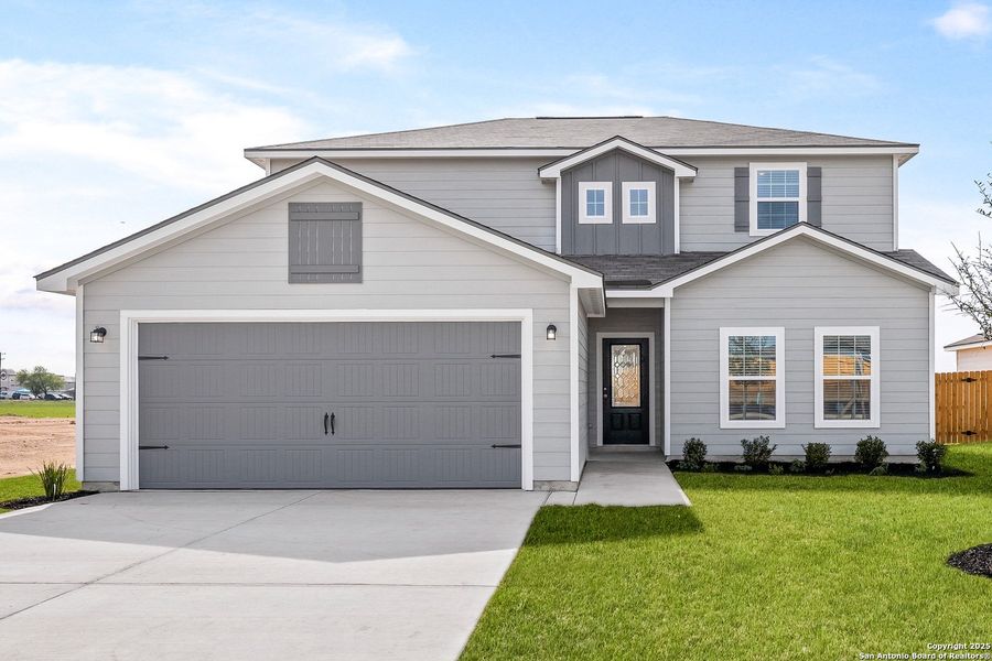 Front exterior of a new home in Rosewood Estates, Lytle, TX, highlighting curb appeal (Image 1). Front exterior of a new home in Rosewood Estates, Lytle, TX, highlighting curb appeal (Image 1).