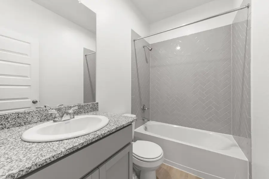 Furnished interior view inside a new home in Villas Las Flores, Floresville (Image 14).