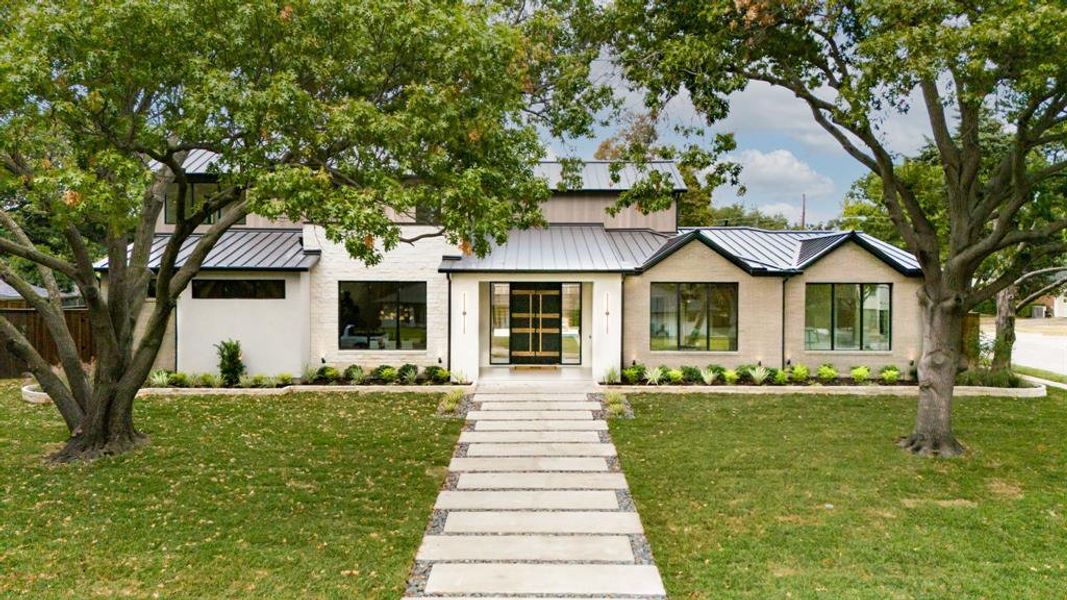 Front exterior of a new home in , Dallas, TX, highlighting curb appeal (Image 2). Front exterior of a new home in , Dallas, TX, highlighting curb appeal (Image 2).