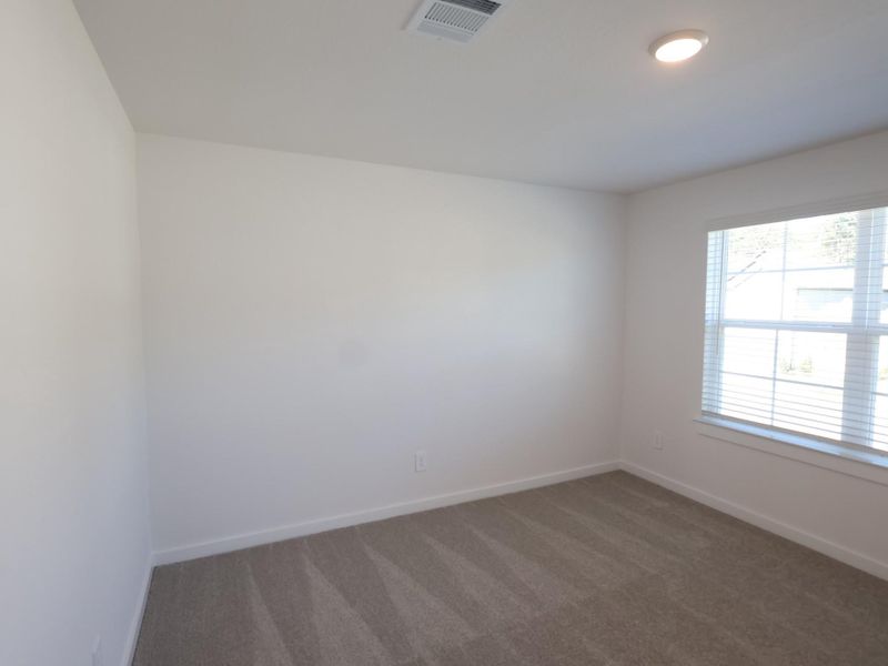 Spacious, unfurnished interior of a new home in Sorella, Tomball (Image 12).