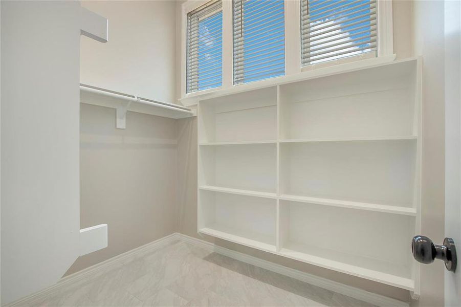 View of walk in closet View of walk in closet