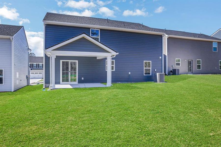 Exterior details and patio area of a home in Summertree, Stone Mountain (Image 20).