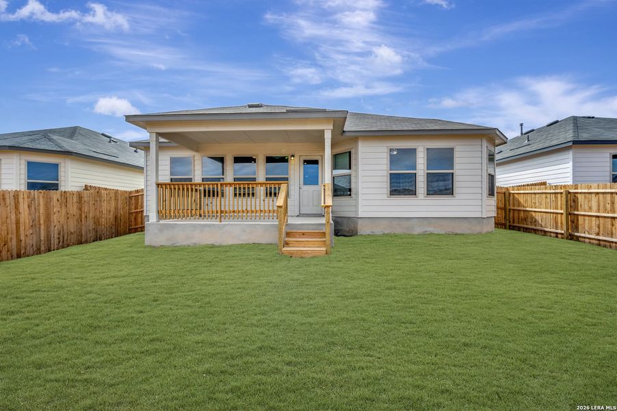 Exterior details and patio area of a home in Winding Brook, San Antonio (Image 27).