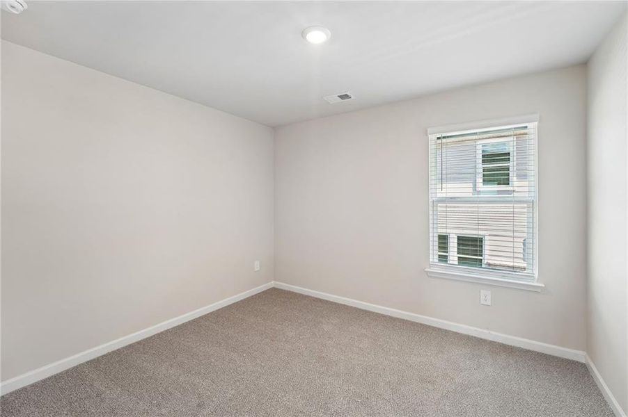Spacious, unfurnished interior of a new home in Hemingway - Reserve Series, Cumming (Image 60).