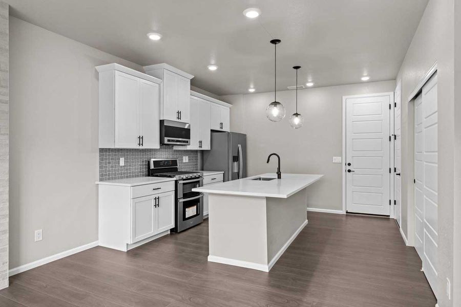 Furnished interior view inside a new home in Ralston Creek, Arvada (Image 9).