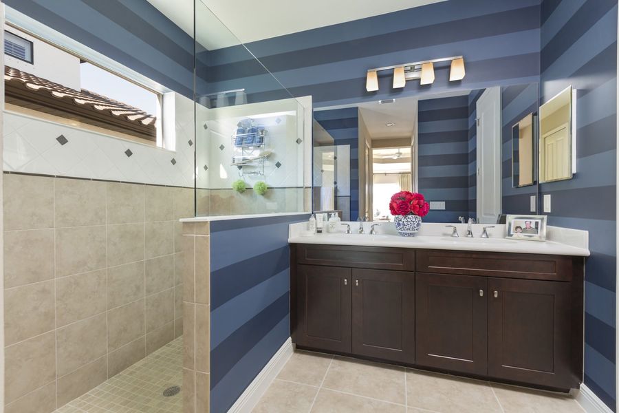 Representative furnished interior of a home built from the Applause by Neal Communities in Boca Royale Golf & Country Club at Wellen Park, Englewood (Image 15).