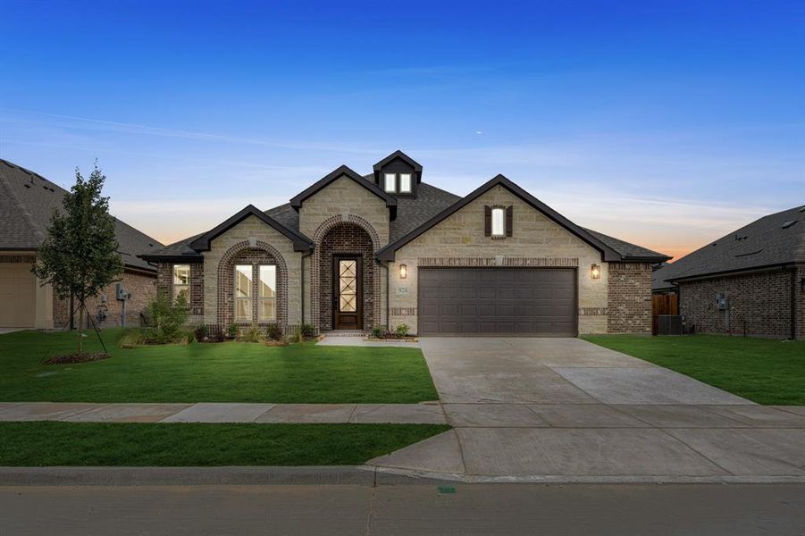 Front exterior of a new home in West Crossing, Anna, TX, highlighting curb appeal (Image 2). Front exterior of a new home in West Crossing, Anna, TX, highlighting curb appeal (Image 2).