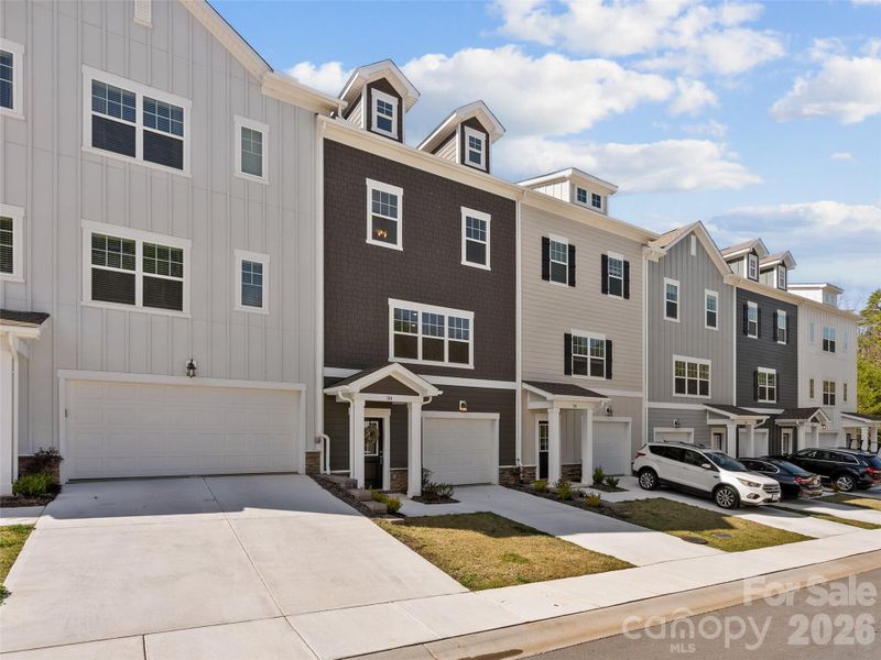 Front exterior of a new home in , Asheville, NC, highlighting curb appeal (Image 20).