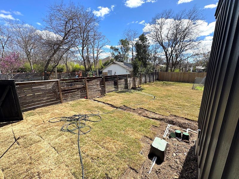 View of yard featuring a fenced backyard