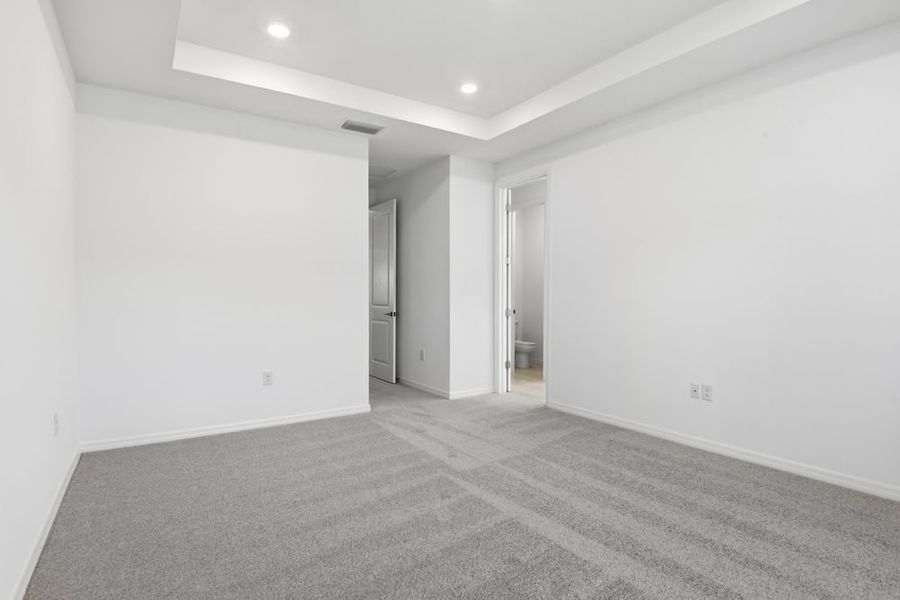 Representative unfurnished interior of a home built from the Barbados by Taylor Morrison in Ardisia Park, New Smyrna Beach (Image 30).