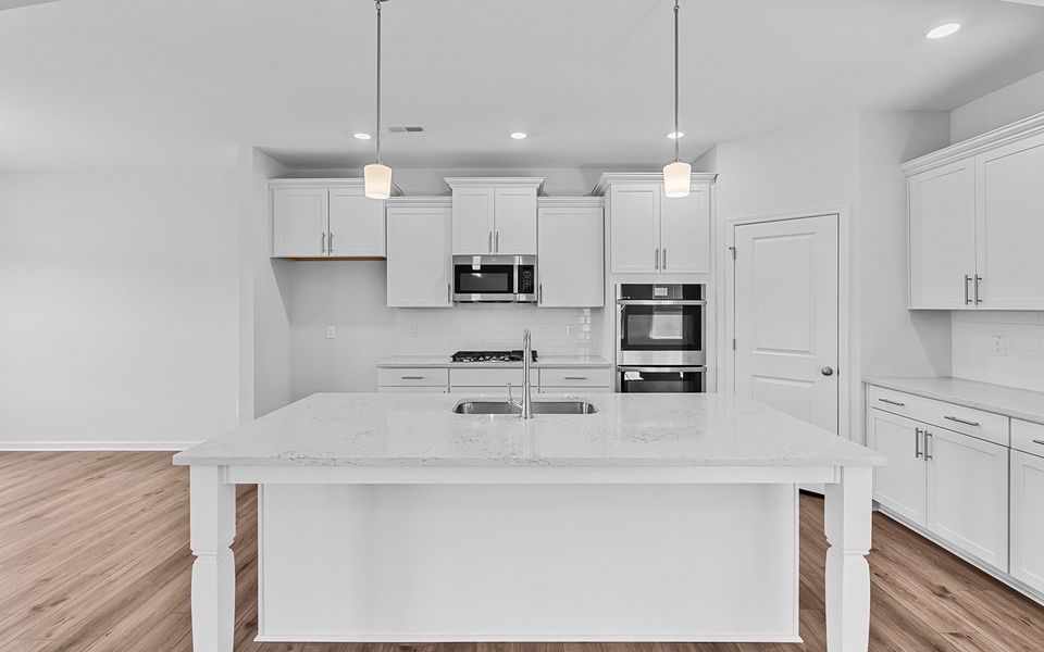 Furnished interior view inside a new home in Brayden, Advance (Image 10).