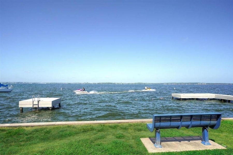 Just chill out watching the beautiful blue lake!  Maybe throw in a fishing pole and get a fresh fish for dinner! Maybe enjoy that splash in the lake!  Resort style lifestyle in Point Aquarius Community!